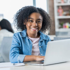 Image of a child using a laptop