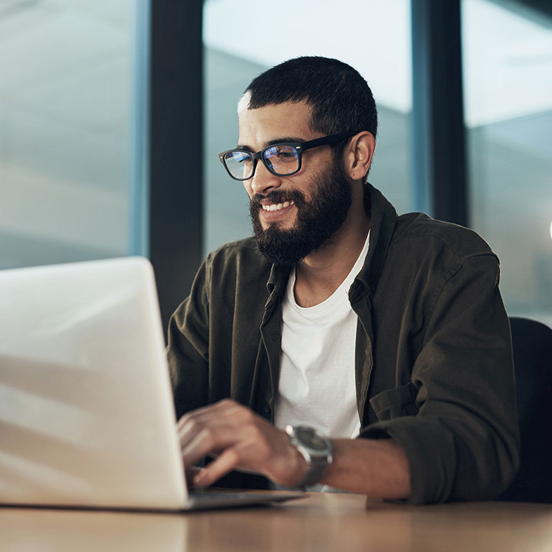 Image of a man using laptop